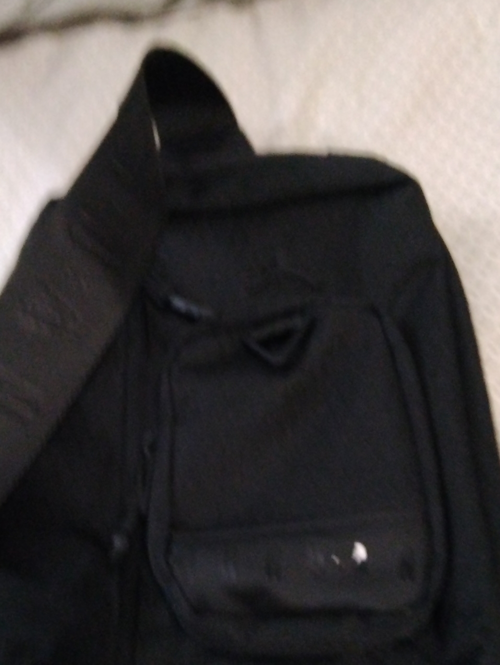Minimalist Black Men's Sling Bag with Adjustable Strap